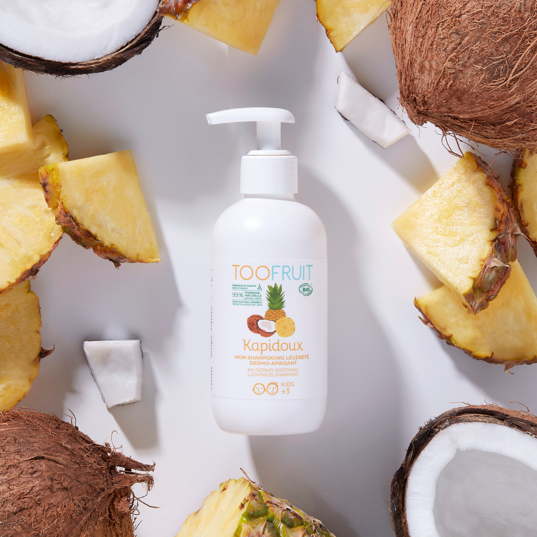 a bottle of toofruit pineapple and coconut shampoo