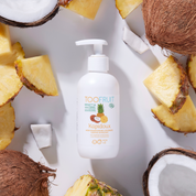 a bottle of toofruit pineapple and coconut shampoo