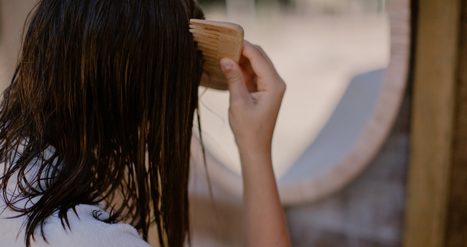 girl combing hair