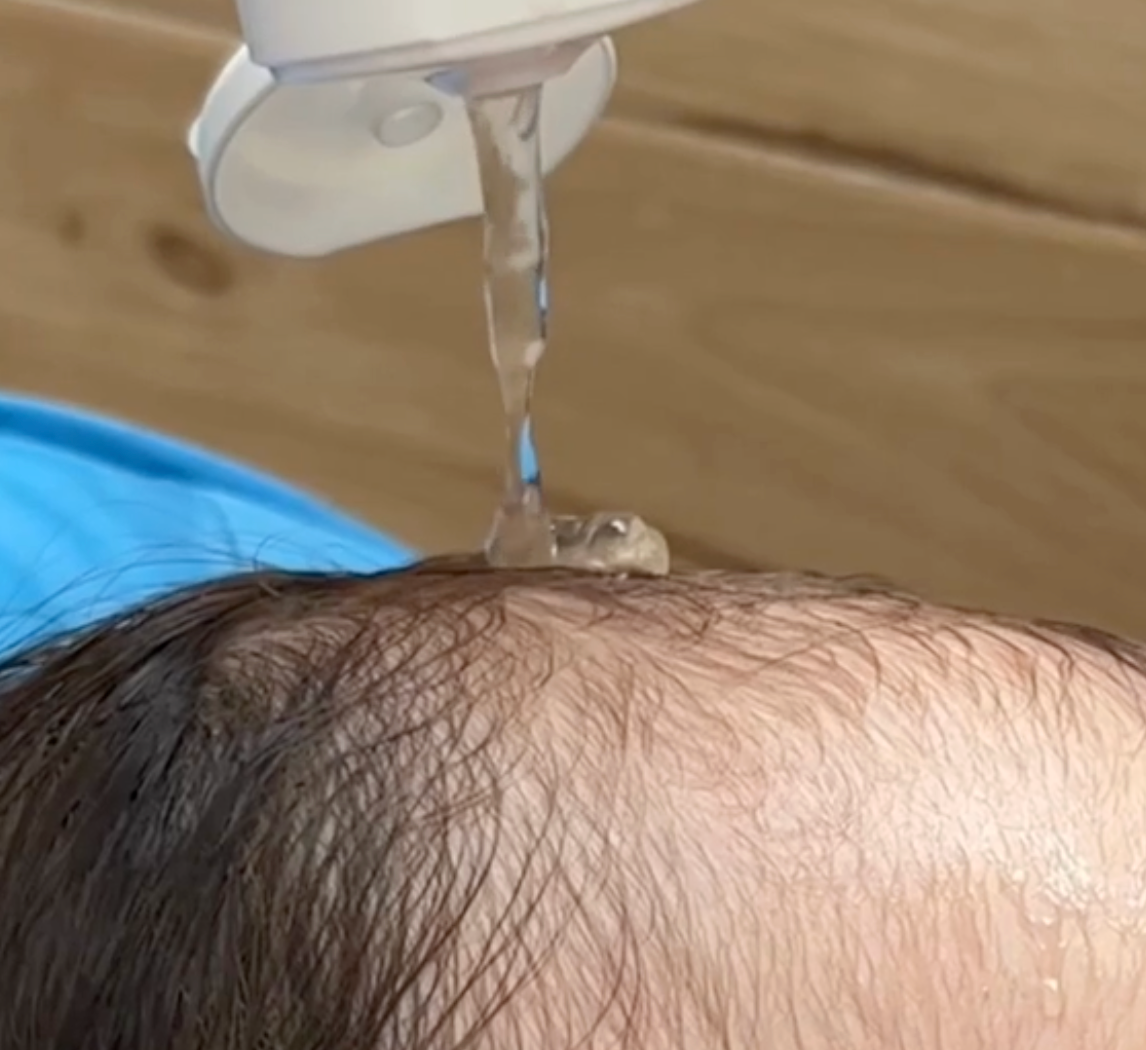 Shampoo on baby scalp