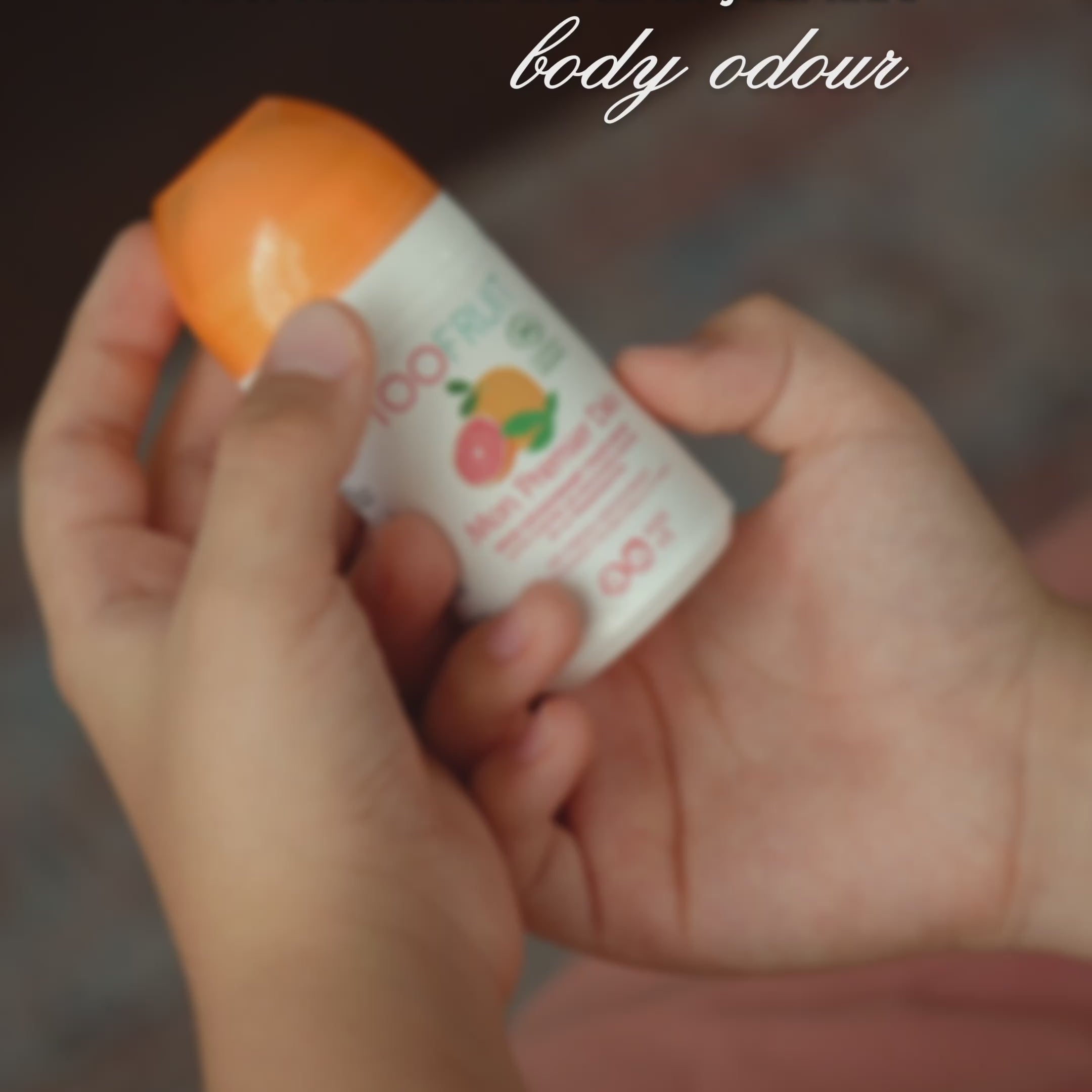 a boy using toofruit aluminium free 
deodorant