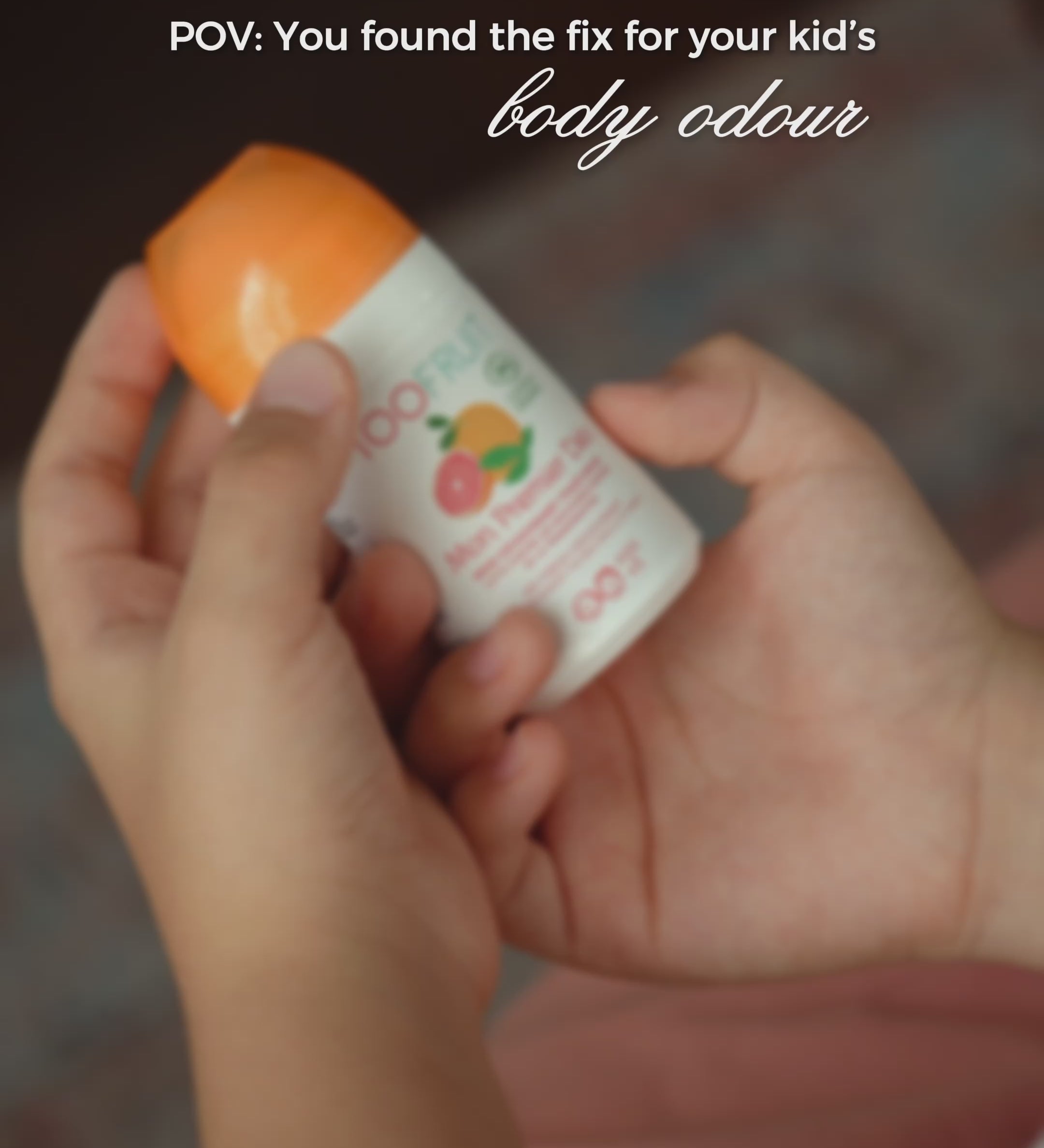 a boy using toofruit aluminium free 
deodorant