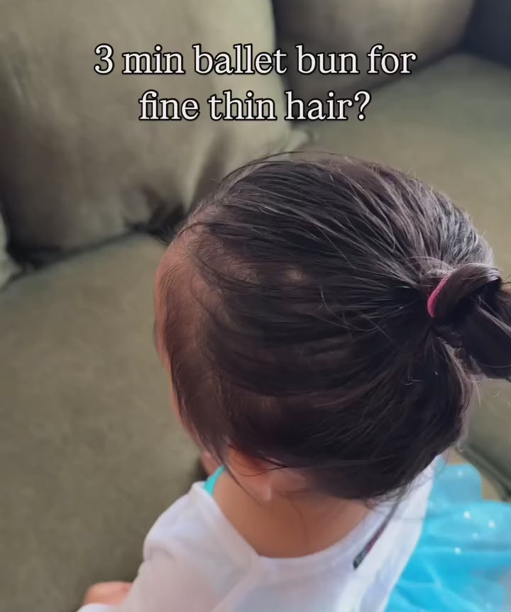 using the smooth and style set made up of toofruit detangling spray and toofruit hair styling paste to create an effortless ballet bun