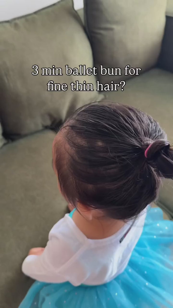 using the smooth and style set made up of toofruit detangling spray and toofruit hair styling paste to create an effortless ballet bun