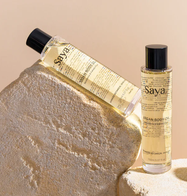 two bottles of saya argan body oil