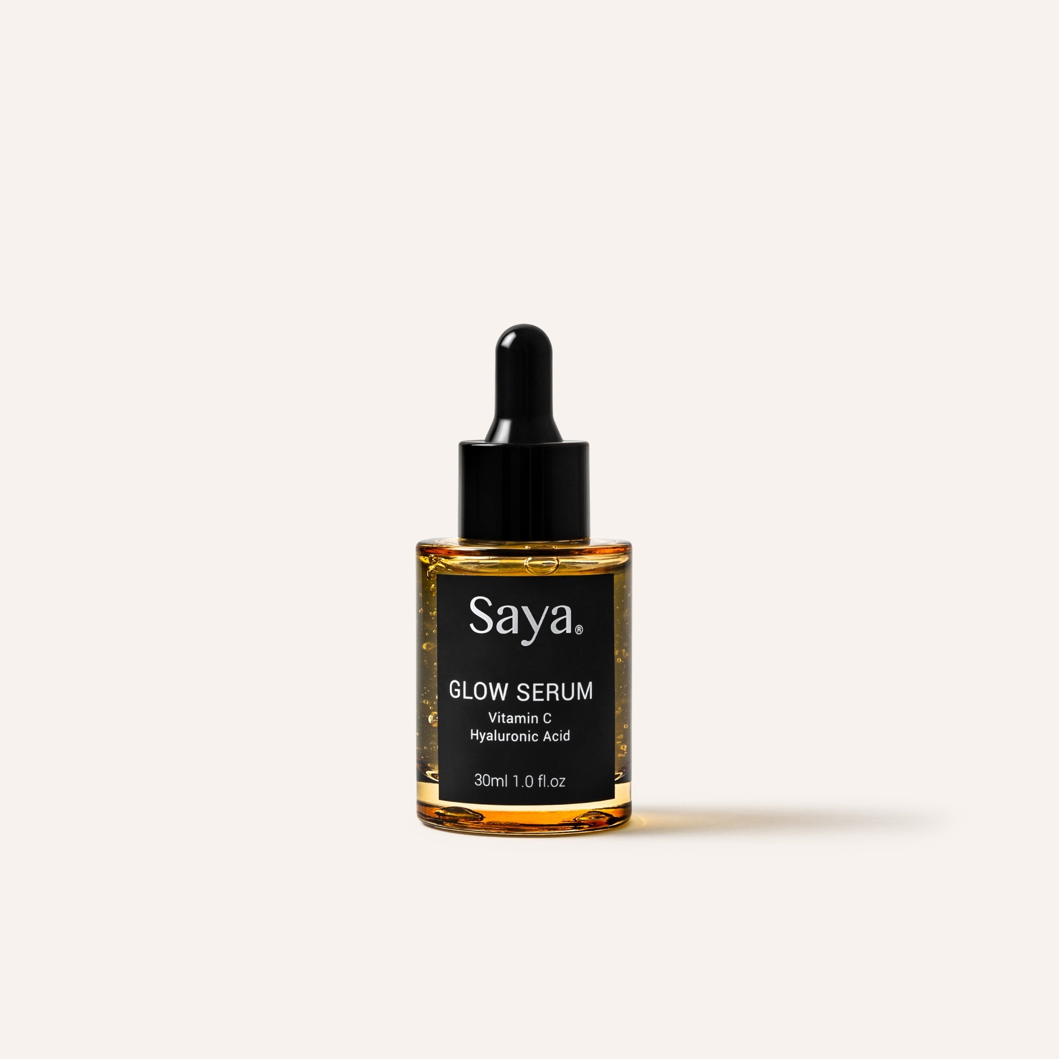 a dropper bottle of saya glow serum