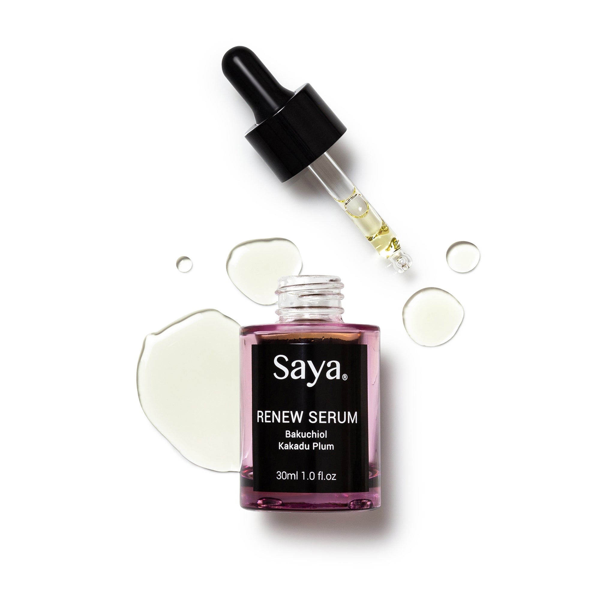 an opened bottle of saya renew serum with dropper beside it