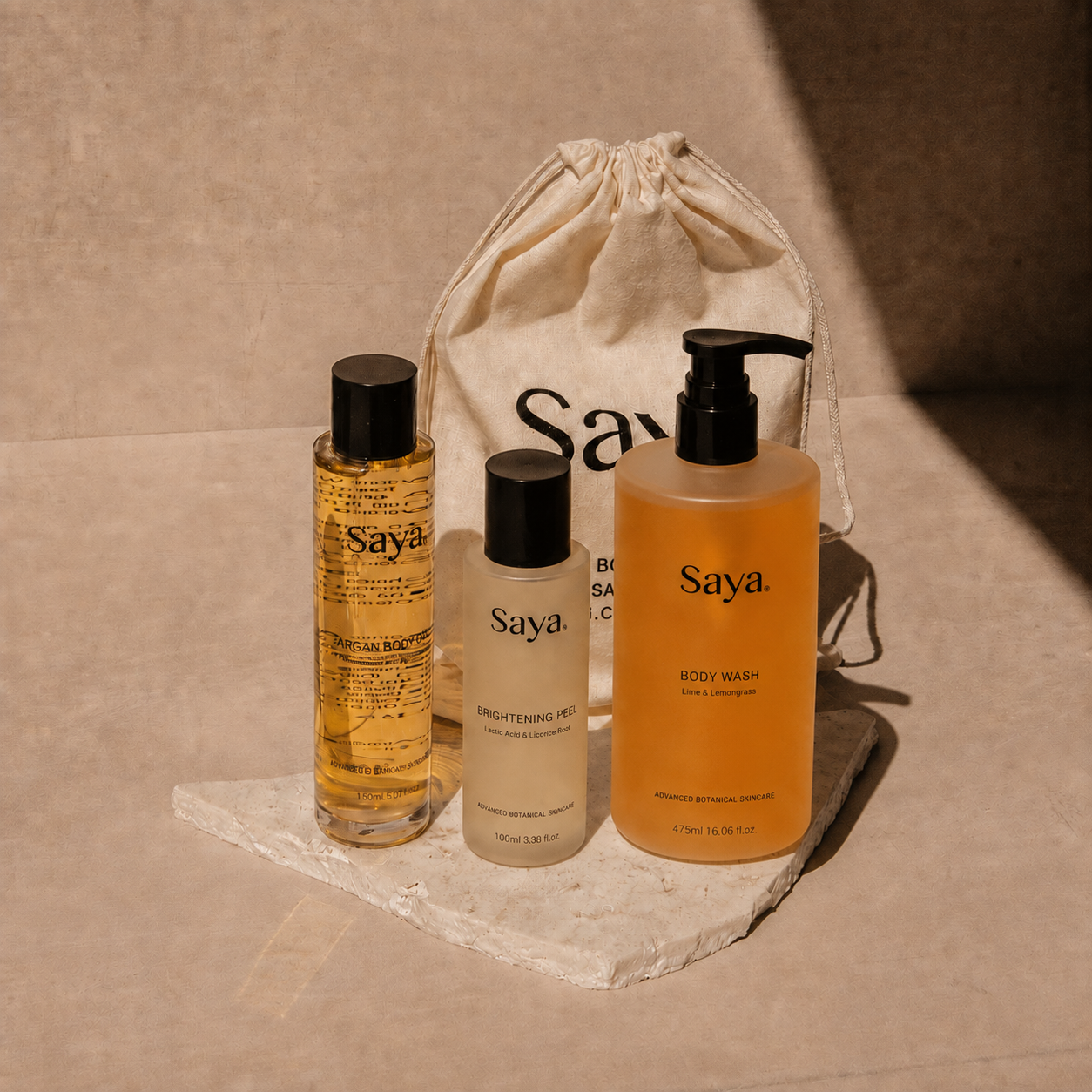 Saya Smooth & Soothe Trio shave set with Argan Body Oil, Brightening Peel and Body Wash in a cotton pouch