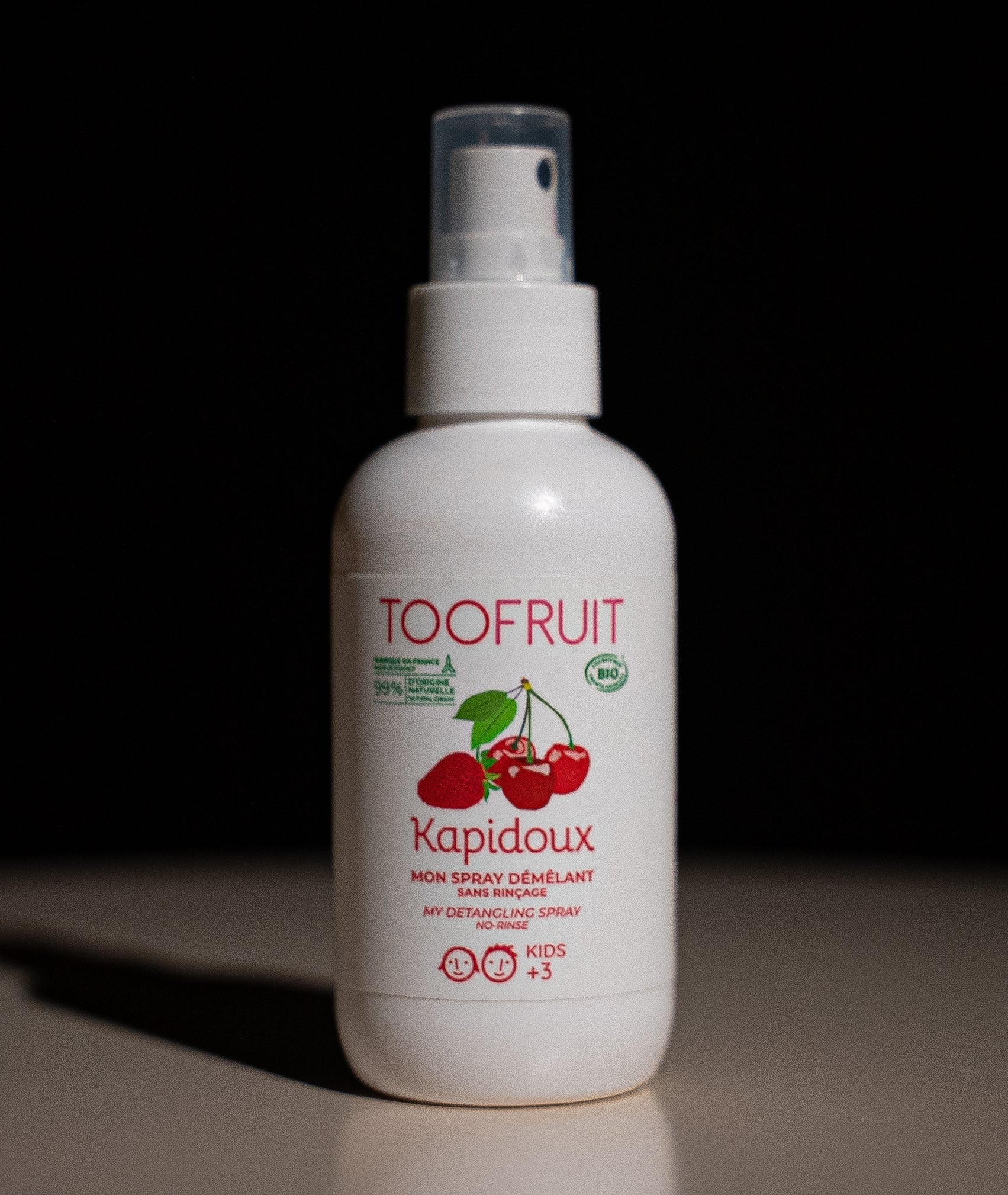 a bottle of detangling spray