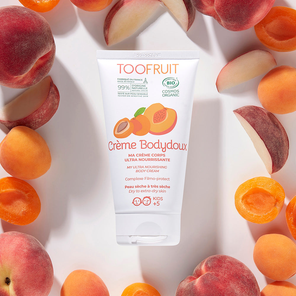 a tube of toofruit creme bodydoux and its ingredients