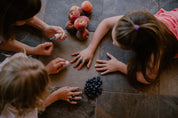 three girls painting their nails with toofruit nail polishes