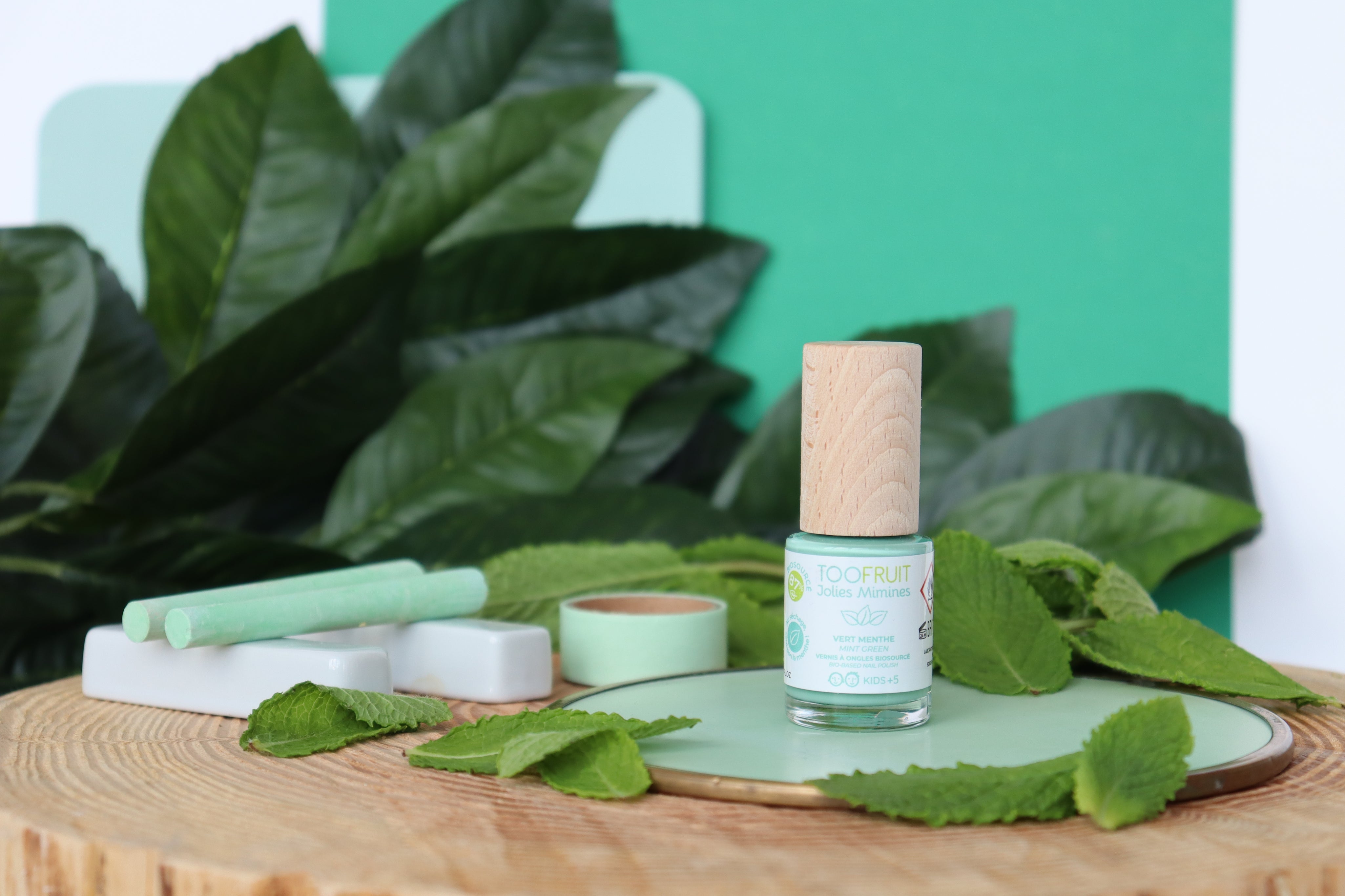 a bottle of toofruit mint nail polish