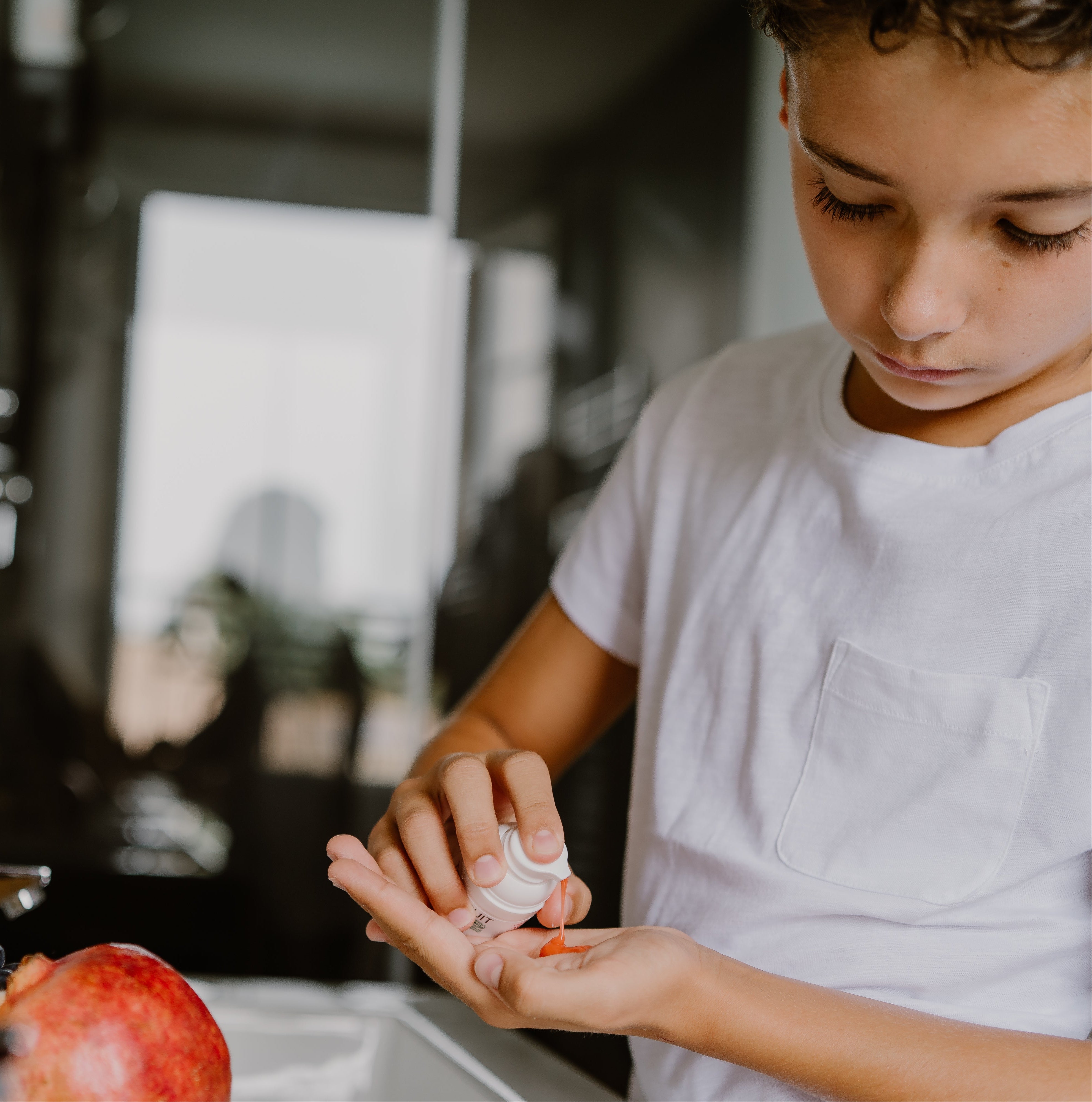 a boy pumping toofruit so cool on his palm