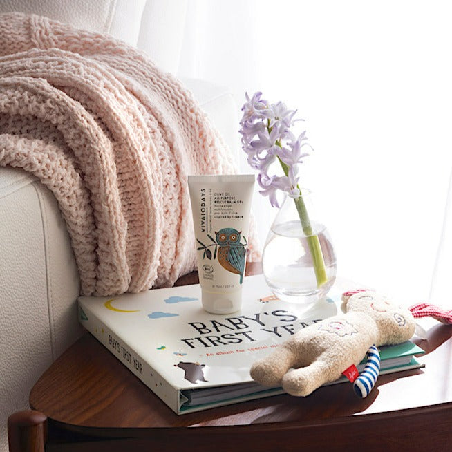 a tube of vivaiodays days balm gel on a baby book